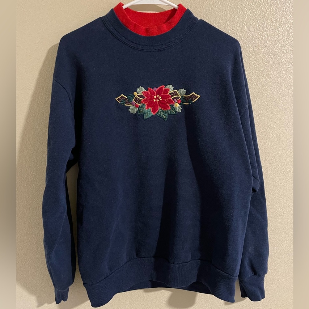 blue & red vintage turtleneck sweater with mistletoe on front.